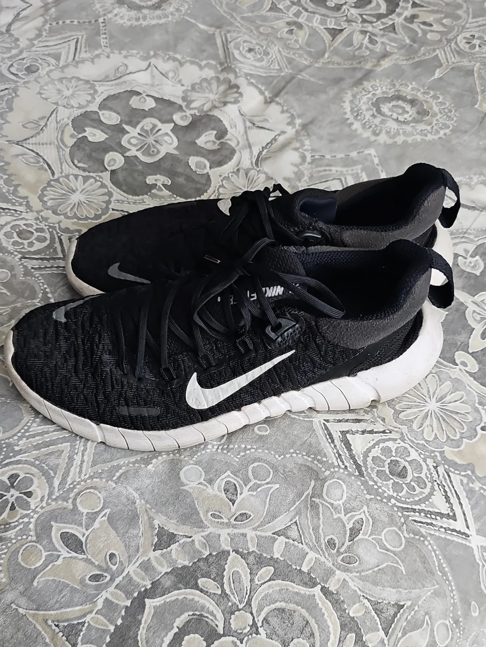 Nike Black Athletic Shoes with White Swoosh